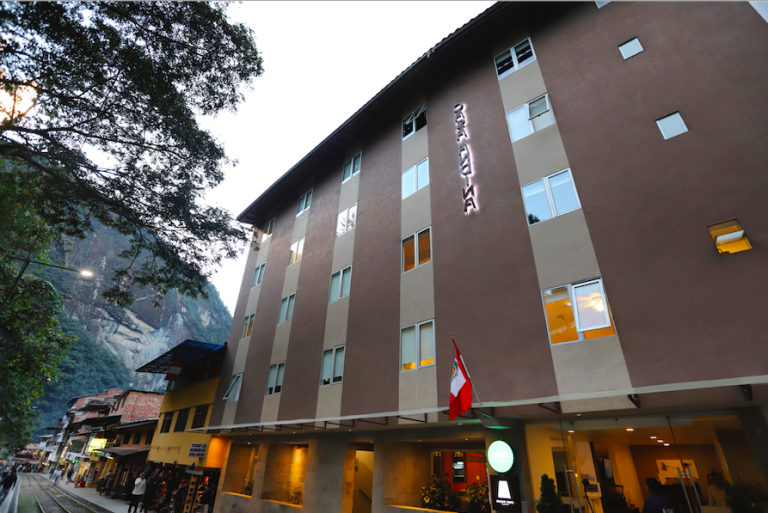 Exterior view of Casa Andina Standard hotel in Machu Picchu town with modern amenities.