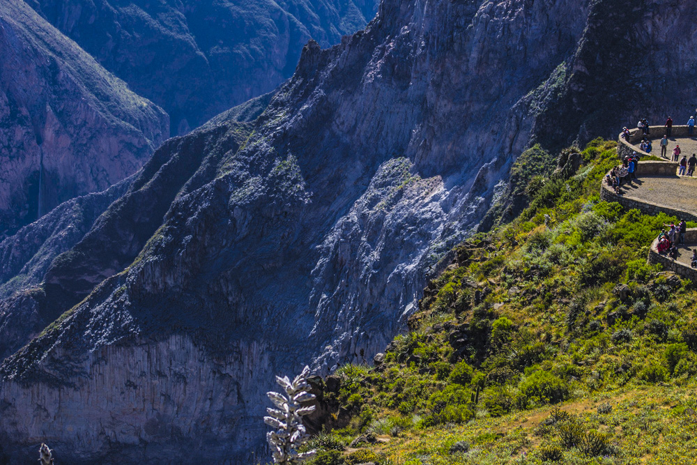 Panoramic view of Colca Canyon with terraced hills.